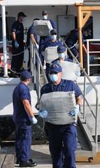 Crewmembers aboard Coast Guard Cutter Venturous, homeported in St. Petersburg, Fla., offloads $23 million worth of cocaine at Sector St. Petersburg Tuesday, Oct. 22, 2013. The crew returned with the contraband after a 40-day patrol in support of Operation Caribbean Guard. U. S. Coast Guard photo by Petty Officer 1st Class Crystalynn A. Kneen