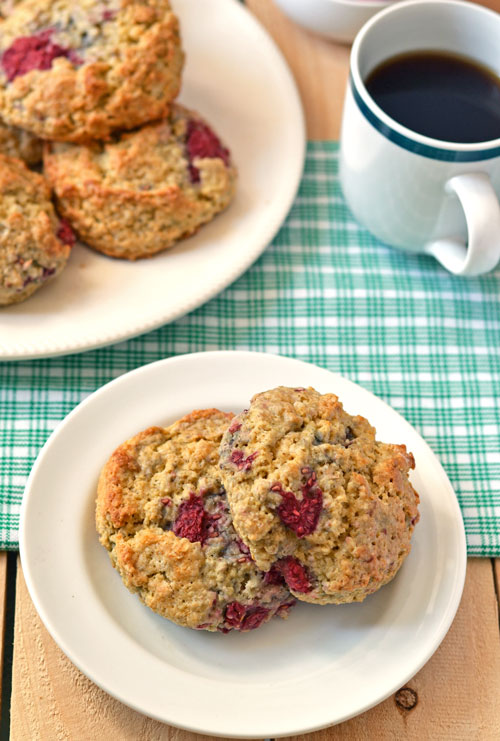 Raspberry scones made with oatmeal on two white plates