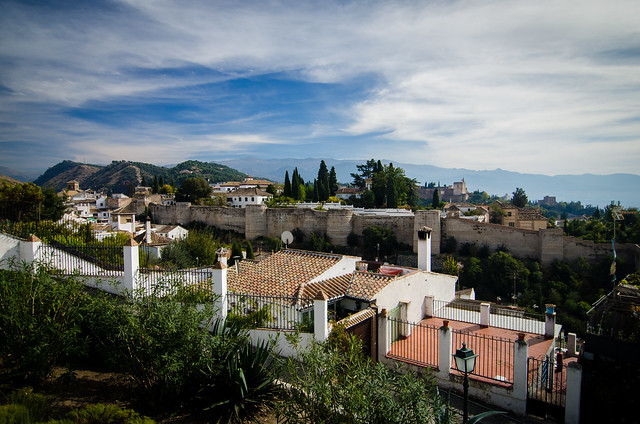 The, slightly obstructed, view of the Alhambra as seen from the San Cristobal Mirador in Granada, Spain.