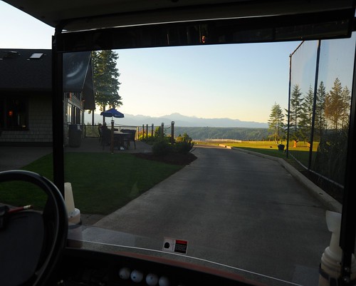 Framing a view of the Olympic Mountains from my auntie's golfcart, golf ball screen, Alderbrook Golf Course, Union, Washington, USA by Wonderlane