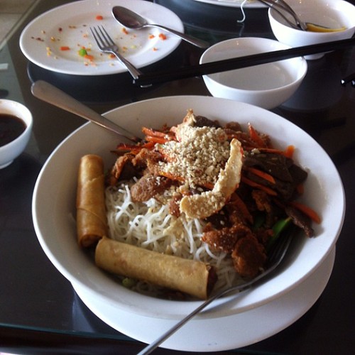 Vegan vermicelli bowl with imitation chicken, beef, shrimp, and pork spring rolls. #yegfood by raise my voice