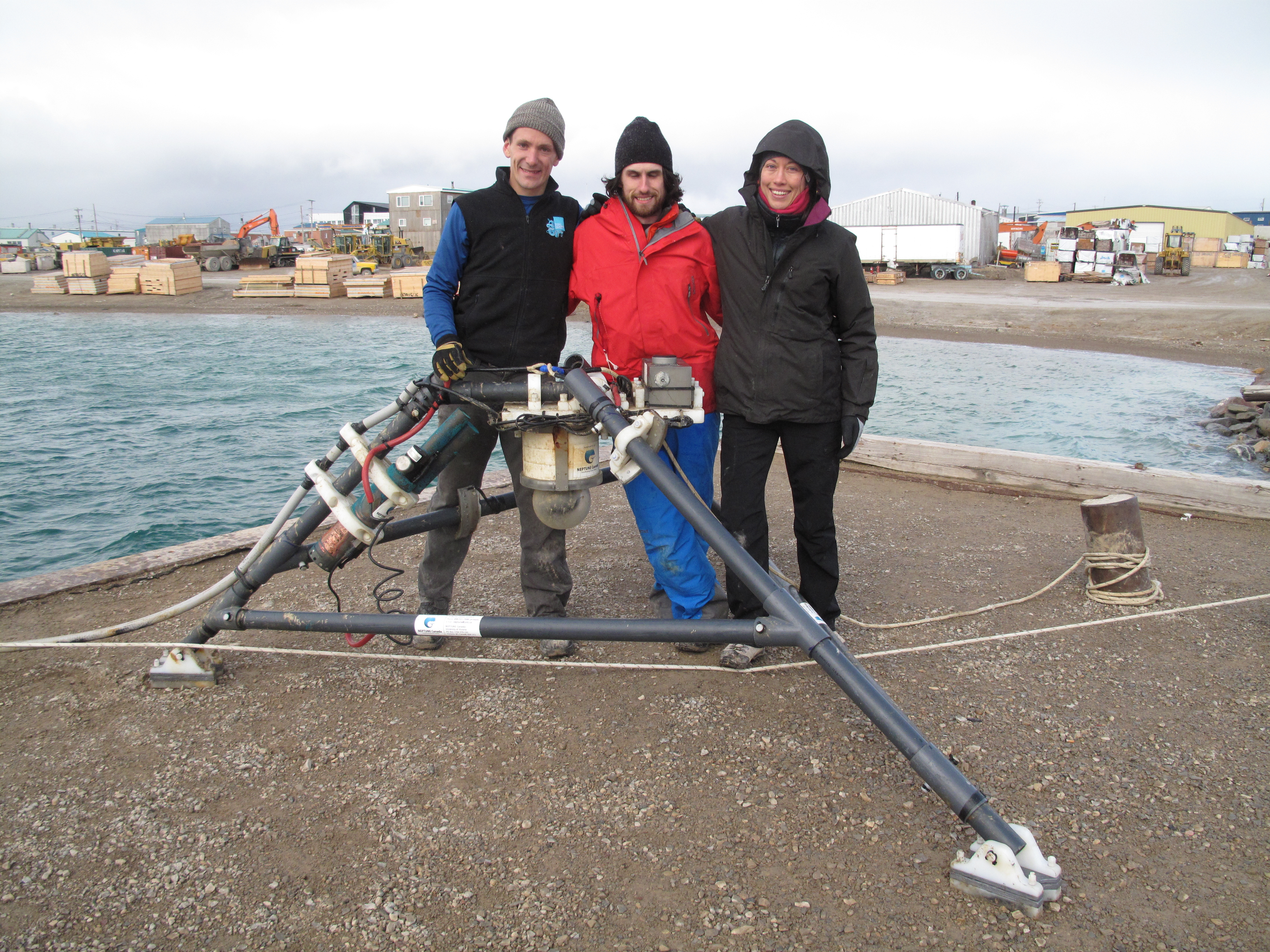 As part of the northern community observatory's first annual maintenance and upgrade, an ONC Science and Engineering team headed north to the Nunavut Hamlet of Cambridge Bay. From left to right: Lead Project Engineer Ryan Flagg, Electrical Technician Ryan Key, and Scientific Data Specialist Alice Bui.