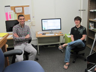 Image of development team with large and fancy computers