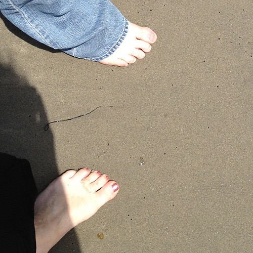 Our feet in the sand