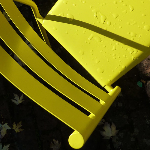 wet yellow chair by pho-Tony