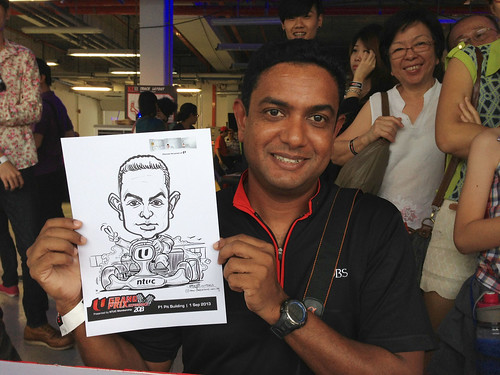 caricature live sketching for NTUC U Grand Prix Experience 2013 - 14