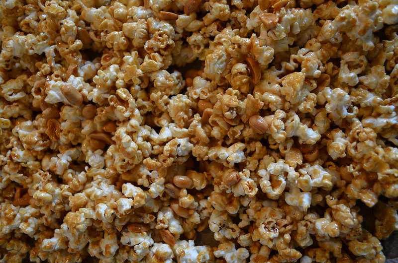 Salted caramel bourbon popcorn with peanuts close-up