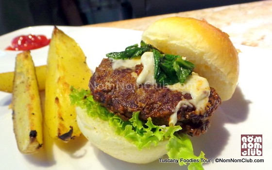Artisanal All-Beef Burger with tuyo blue cheese spread in a Furikaki bun