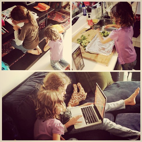 Children working, playing, and learning on art projects, writing, and a laptop computer