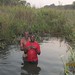 Harry Jikata baptizing a man at Ndati
