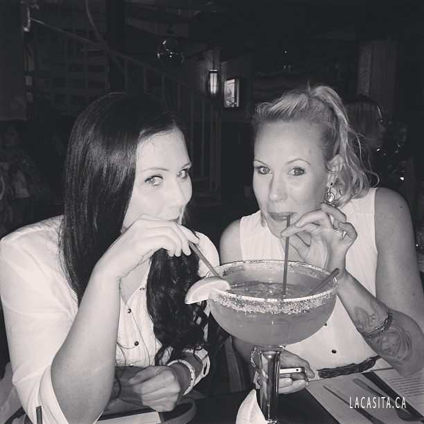 Bigger is better in this case! Ladies sipping on super margarita at La Casita Gastown in Vancouver BC