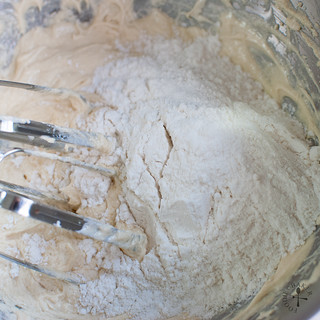 add in ½ of the flour