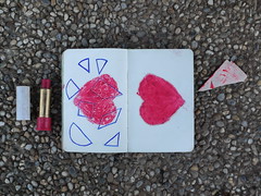 Broken Heart Tangram in my Book of Playing "Homo Ludens" - Old Lipstick, used for drawing - Broken Off Corner from the drawing "Stubbed ~ Gerodet beim Narrenturm; Ein Leidensblatt" on the Paper from the Abandoned Cement Plant - MirrorGround Steinhof