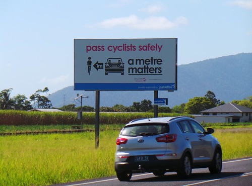 Cairns roadside billboard Bruce Highway, Fishery Falls, 32.8km, Cairns South 1013
