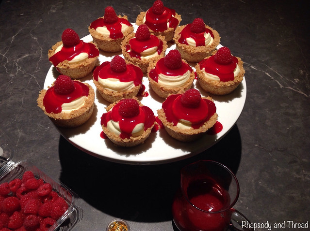 Easy No-Bake Mini Raspberry Cheesecakes With Fresh Raspberry and Gold Leaf Decoration by Rhapsody and Thread