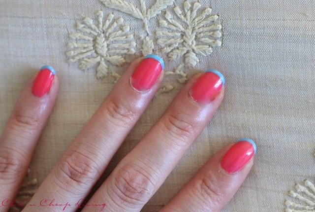 Summer French manicure using Sally Hansen Get Juiced and Chanel Coco Blue on pillow - saved by Chic n Cheap Living