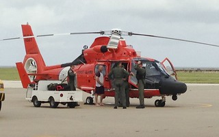 An aircrew from Air Station Corpus Christi engage in conversation with the 46-year-old man, who was hoisted from Corpus Christi Bay Oct. 30, after his sailboat overturned. U.S Coast Guard photograph. - See more at: http://www.uscgnews.com/go/doc/4007/1948498/Coast-Guard-rescues-46-year-old-man-in-Corpus-Christi-Bay#sthash.PMYKapOY.dpuf