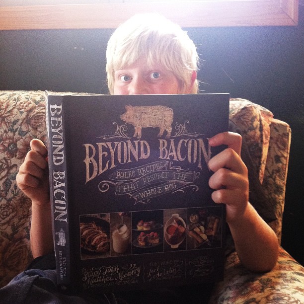 I got #beyondbacon a few days ago. Haven't been able to look through it yet, though. The twelve year old hasn't put it down. He's a fan. @paleoparents #paleo #helovestocook #mmmmbaconjam