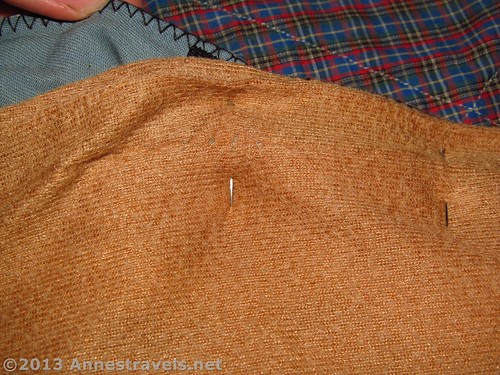 Pinning the open part of the sleeping bag closed