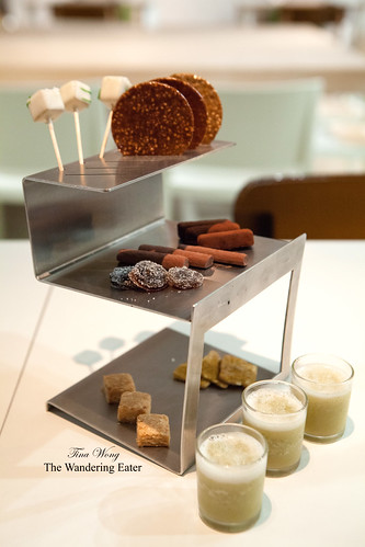 Tower of petit fours and "chupitos" of green apple and laurel