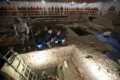 Archaeologists Robin Coningham (left) and Kosh Prasad Acharya direct excavations within the Maya Devi Temple, uncovering a series of ancient temples contemporary with the Buddha. Thai monks meditate. Photo by Ira Block/National Geographic/National Geographic Buddha Birthplace