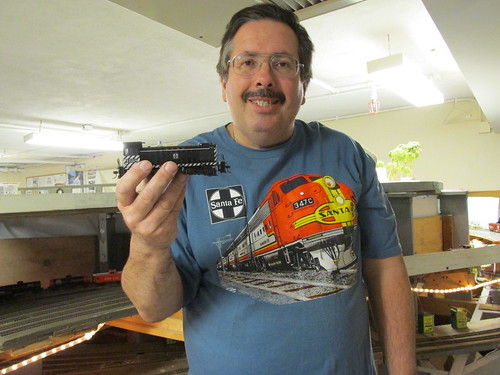 Fellow club member Eddie K, holding his Bachman H.O Scale Santa Fe Alco S 4 yard switcher. by Eddie from Chicago