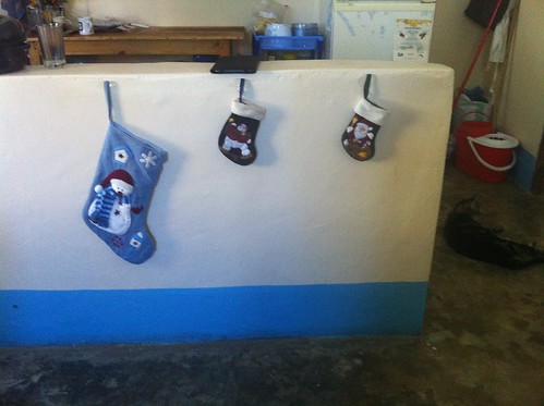The stockings were hung on the wall with care