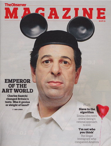 Charles Saatchi wears Mickey Mouse ears on the cover of a mag