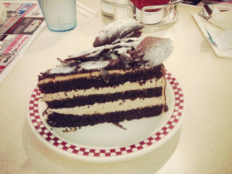 Chocolate layer cake with chocolate curls on top at 29 Diner in Arlington, VA
