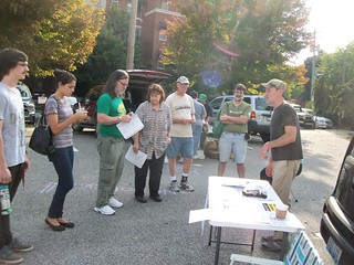 Members listen and learn about the Covington Farmer's Market use of assistance programs.