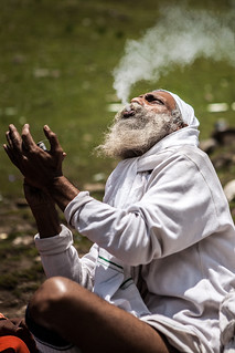 Sadhu lost in smoke, Kashmir, India