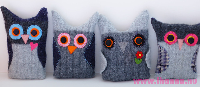 Four recycled sweater owls