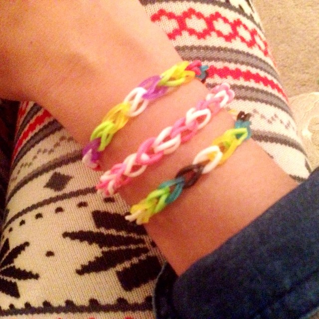 Rainbow loom love. I am so addicted!! Anyone else playing with their kids Christmas gifts? Autumn told me she wants to make bracelets alllll night long!' Oh boy!! She is getting the hang of it and now Nathan wants to try it.