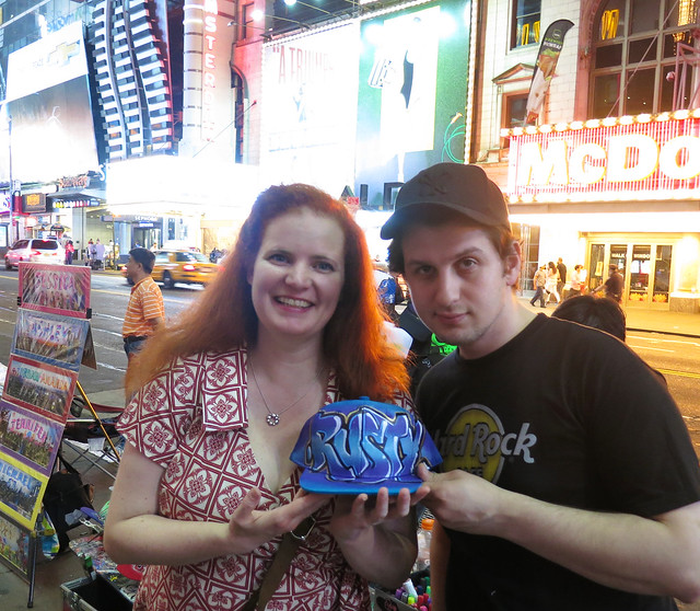 Graffiti Trucker Hat Being Personalized in New York City's Times Square