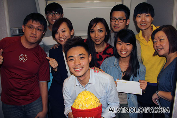 The five happy winners with the two radio deejays and Scoot and GV Movie Club representatives