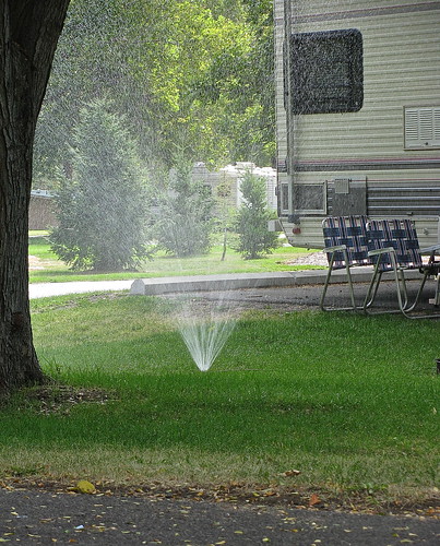 Apparently, this is a thing - campers run sprinklers in their sites