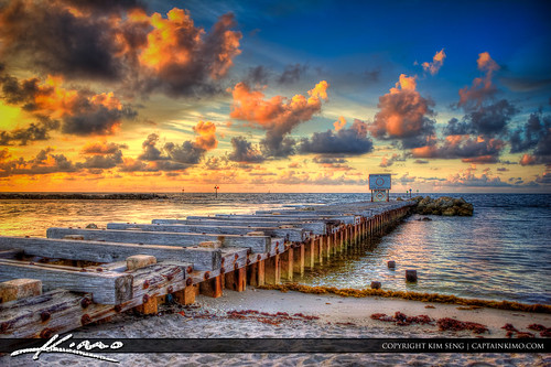 Pilings at the Hillsboro Inlet in Pompano Beach by Captain Kimo