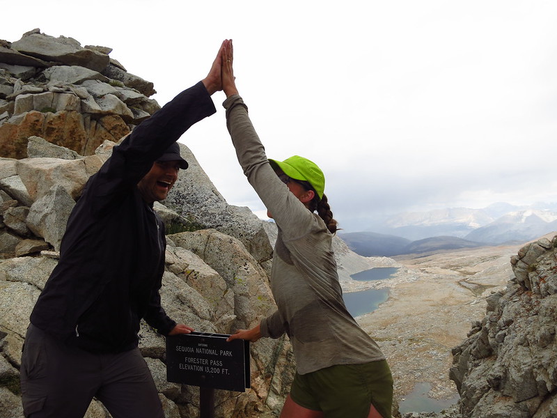 alice and russell high-fiving at forester pass