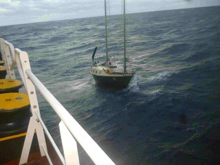 The motor vessel Athina L responded to a Coast Guard Automated Mutual-Assistant Vessel Rescue System request and rescued the sole person onboard the disabled sailing vessel Easy Go on November 3, 2013. 