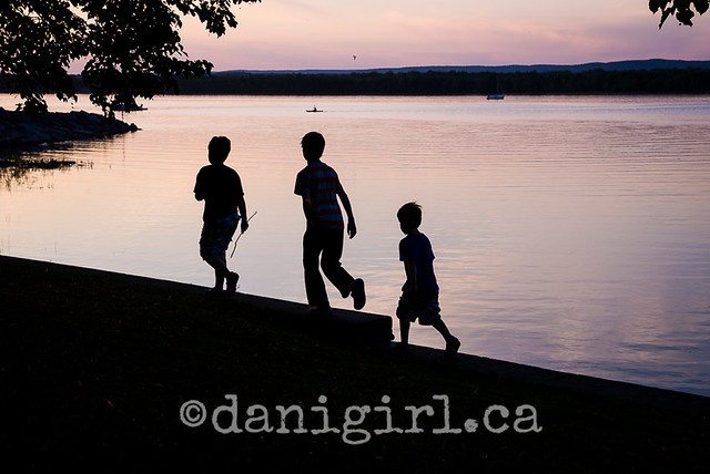 photo of family playing on the beach in Ottawa