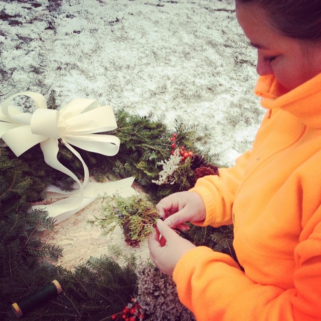 I spent this afternoon decorating the wreaths for the farmhouse. (Photo by Alex.)