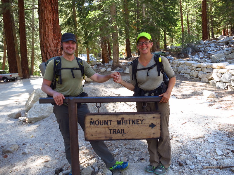alice and russell at the whitney trail sign at whitney portal