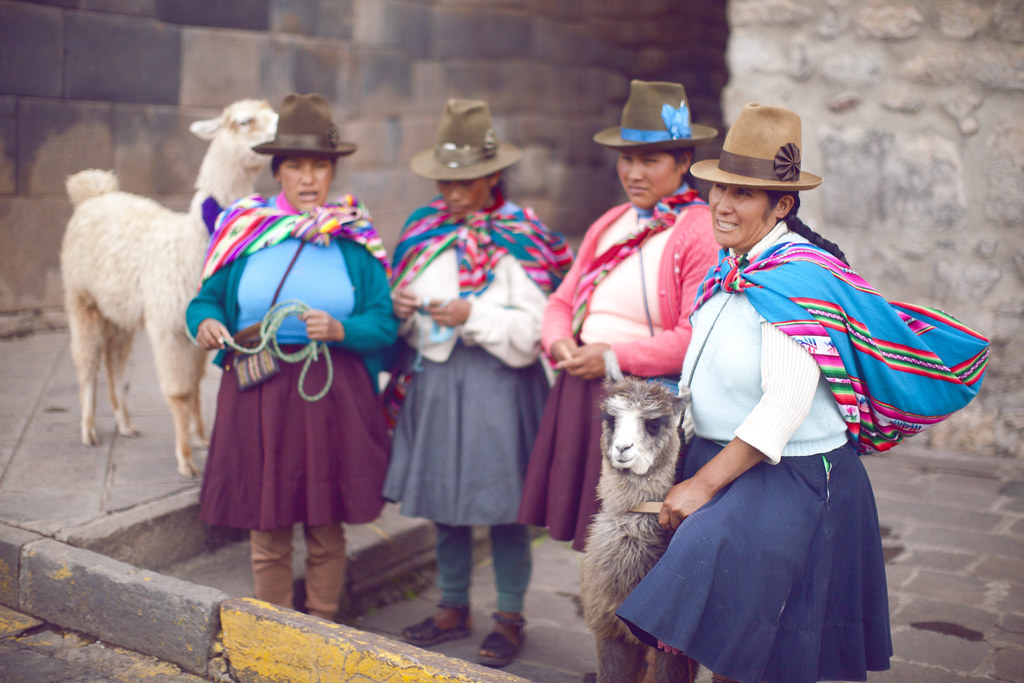 traditional Inca women with llamas in Cusco, Peru
