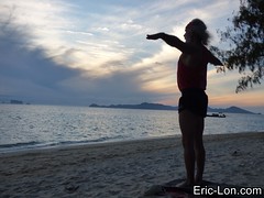 Yoga sun salutations at Kradan Thailand