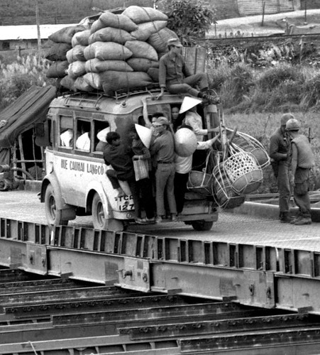 A Gerard Forken photo downloaded from Stars and Stripes: Seabees' new bridge in Vietnam gets a test. 1967 by busboy4