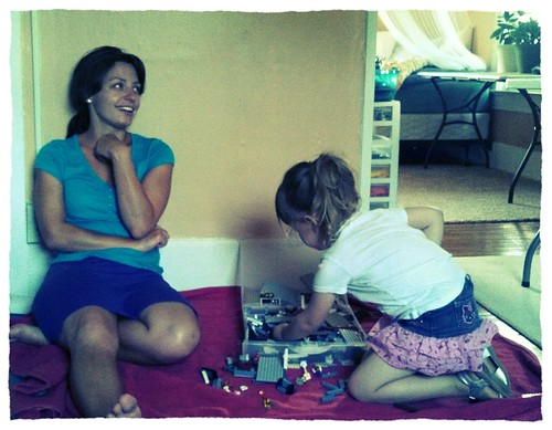 Lily and Aunt Becky playing legos.