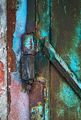 old patterned hinge with rust decay