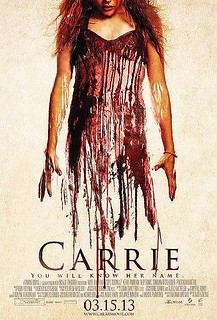 The poster for Carrie, featuring a blood-soaked dress