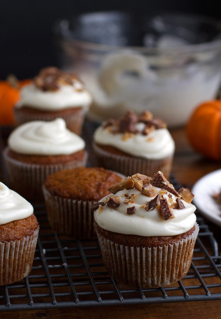 Super Moist Pumpkin Cupcakes with Maple Cream Cheese Frosting and Chopped toffee! #pumpkincupcakes #cupcakes #maplecreamcheesefrosting | Littlespicejar.com