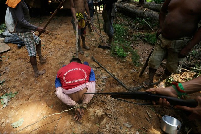 1_amazon-indians-strip-tie-beat-illegal-loggers (6).jpg